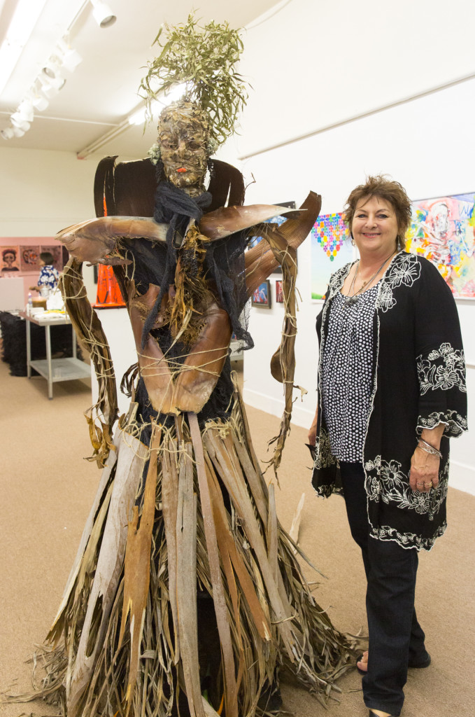 Artist Patty Grau with her "Queen Deadfall," Photo: Jack Burke