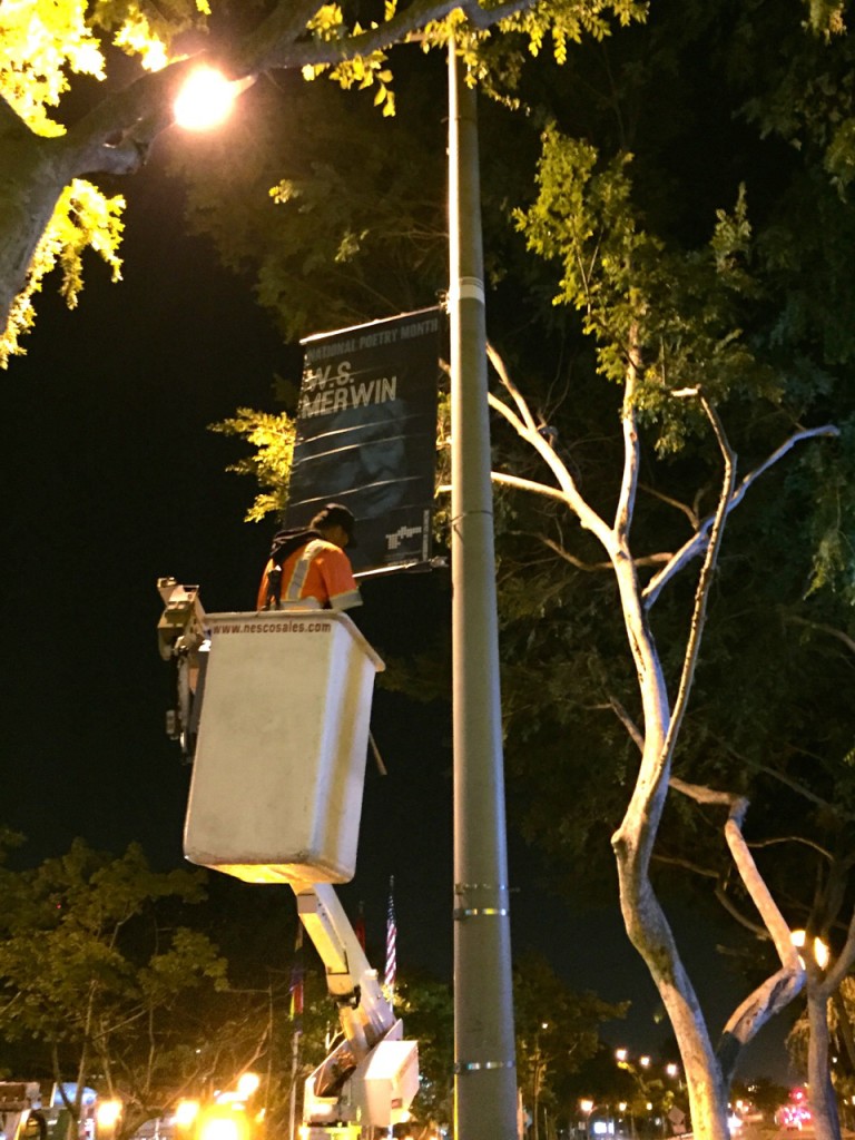 Poetry month banner at night