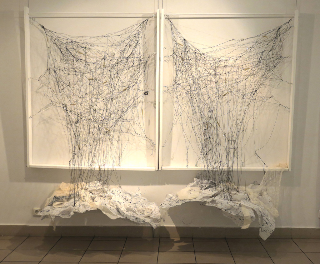 Kathryn Hart_DERAILED, Installation, 87x104x38 inches_wire, twine, glass objects, handmade paper, wood, metal mesh, mixed media and found objects